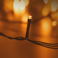Modee Guirlande Lumineuse LED de Noël 100LED 10m Blanc Chaud 2550K IP44 Fil Vert avec Prise Adaptateur