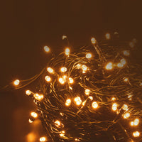 Modee Guirlande Lumineuse LED de Noël 100LED 10m Blanc Chaud 2550K IP44 Fil Vert avec Prise Adaptateur